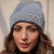 HDC X Emily In Paris Grey Beanie with Pearls, Crystals & Camera Charm