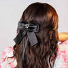 HDC x Emily in Paris Glamour Satin Hair Bow Alligator Clip - Black